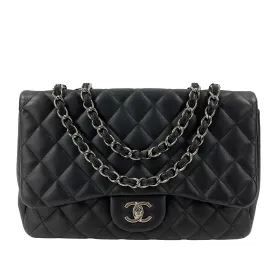 CHANEL - Jumbo Classic Flap CC Quilted Black Lambskin Shoulder Bag / Crossbody